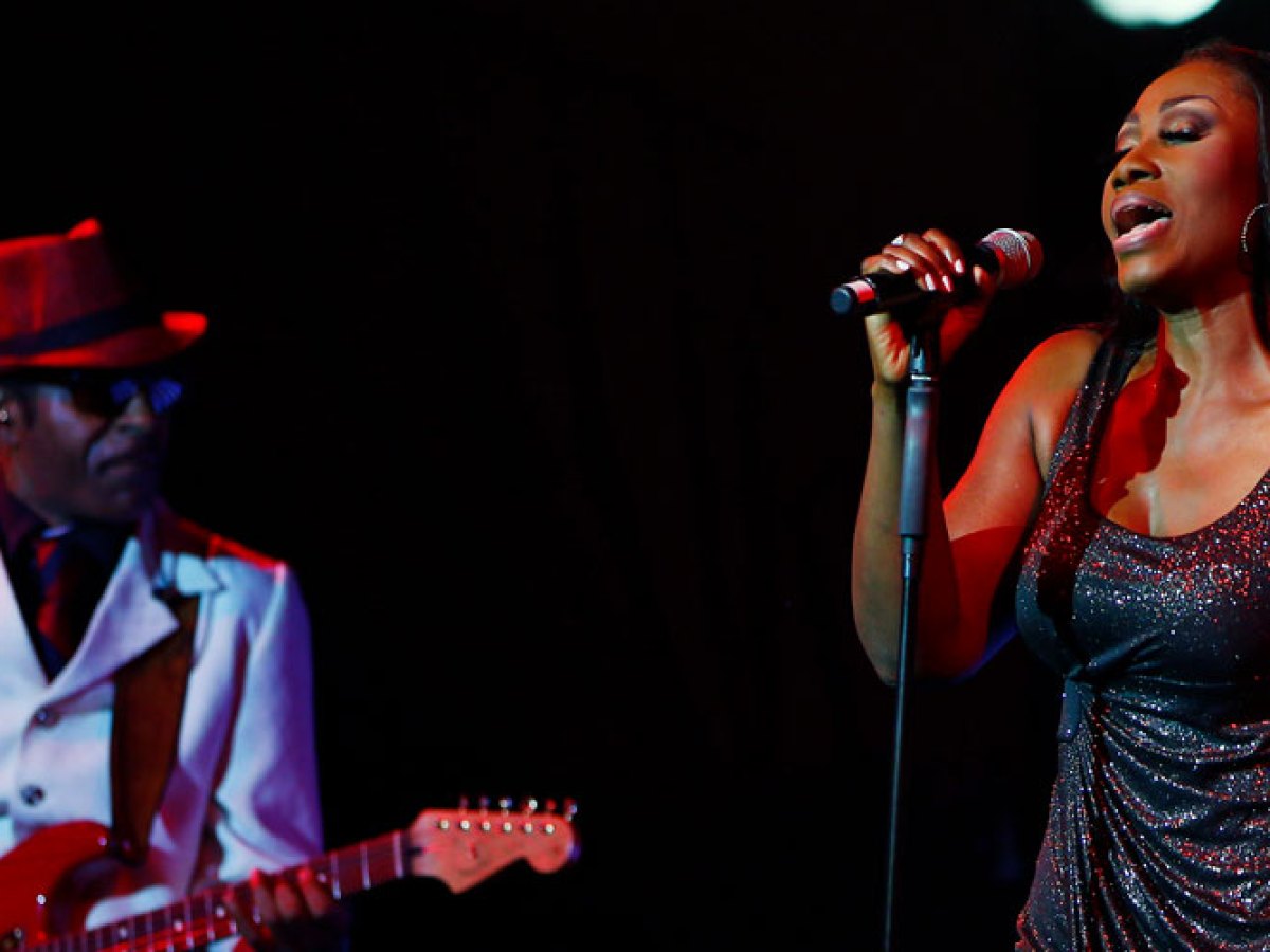 a woman standing on a stage