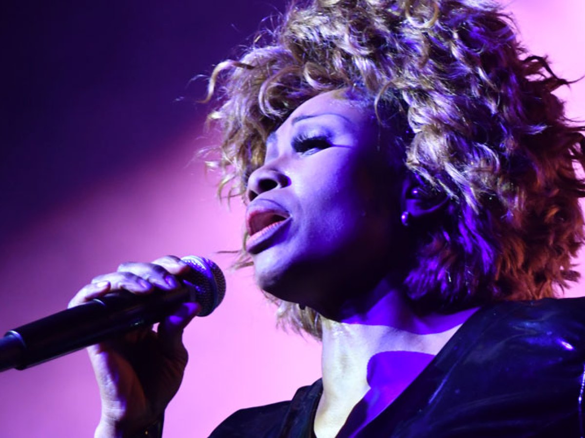 a person wearing a purple stage