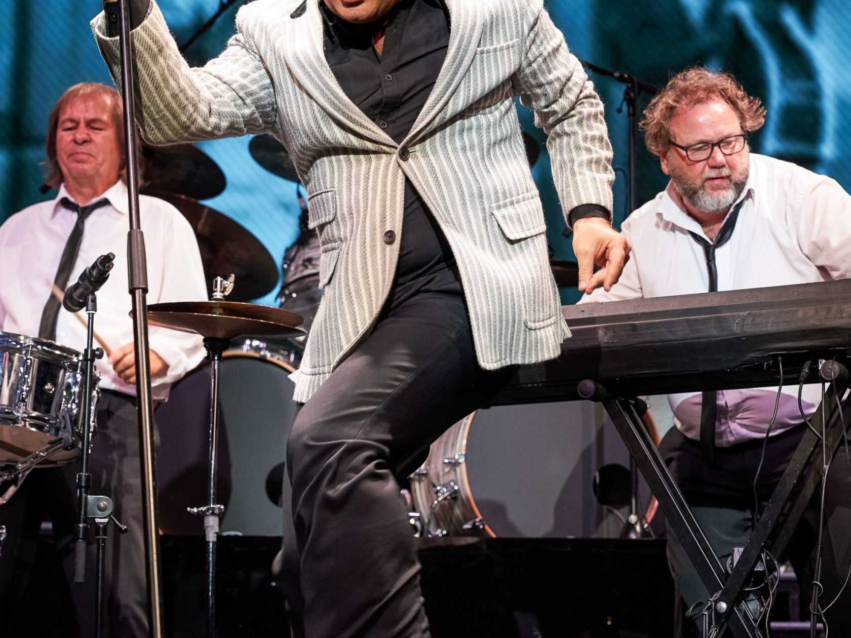 a man sitting on a stage