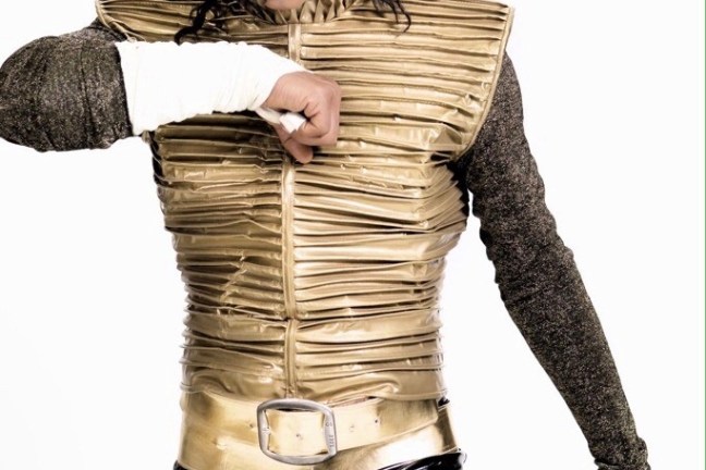 a man standing next to a woman