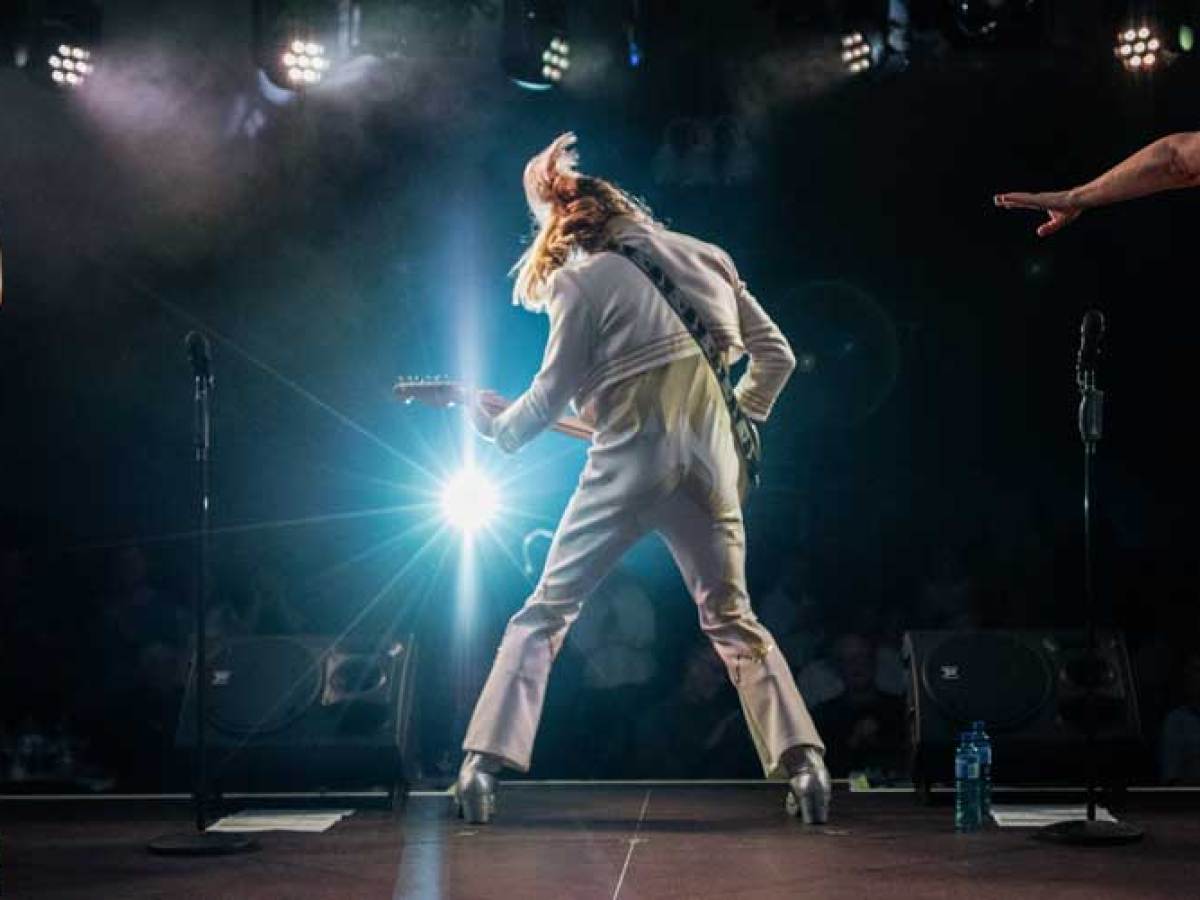 a person standing on a stage