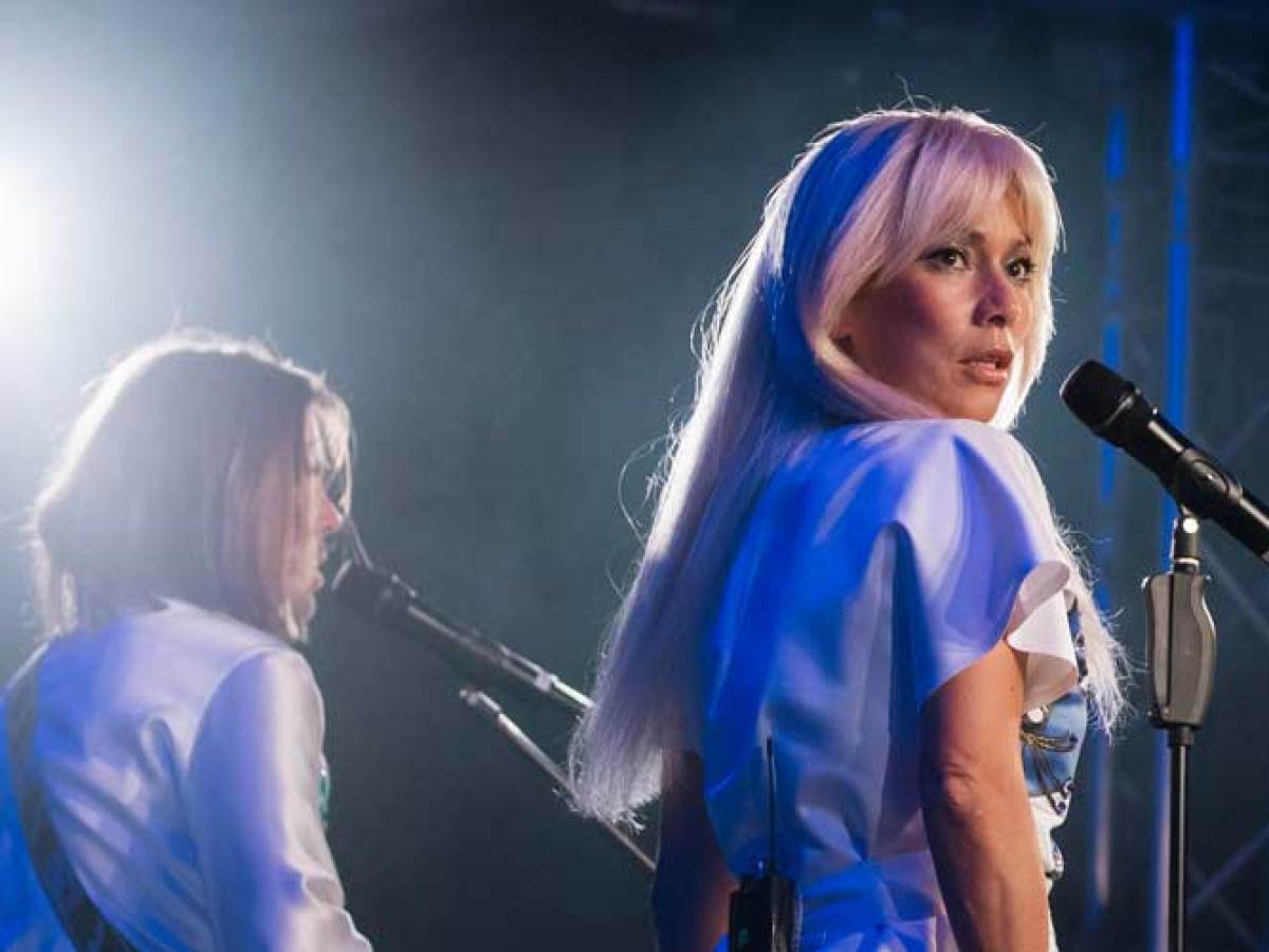 a person standing on a stage