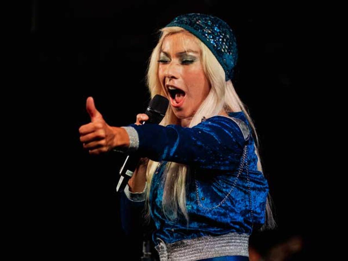 a person holding a microphone